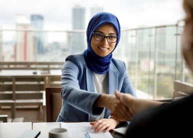 Woman giving a handshake