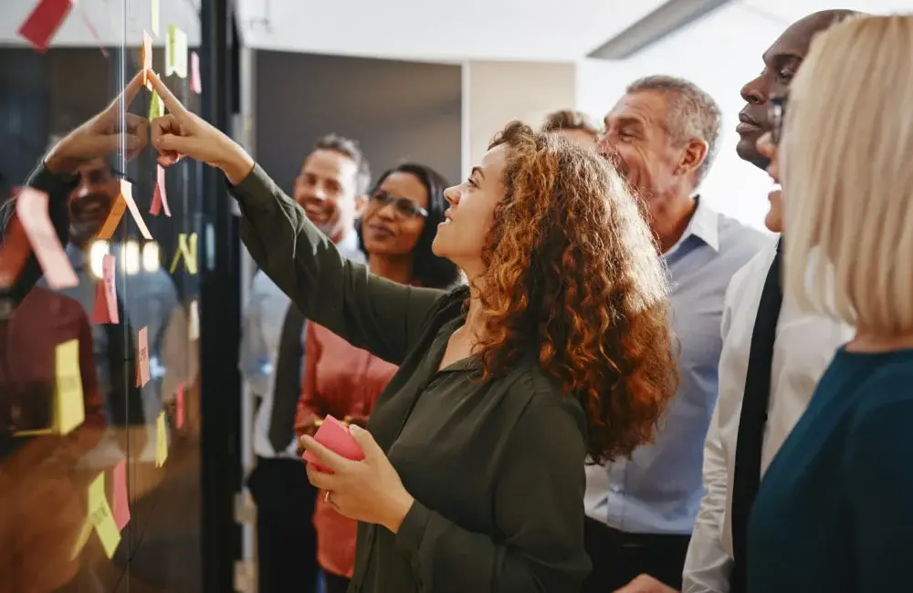 People looking at pin board